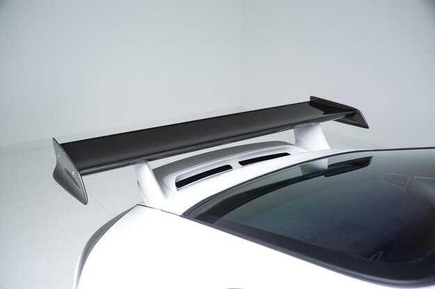 Aerodynamic tuning – spoilers, splitters, and downforce